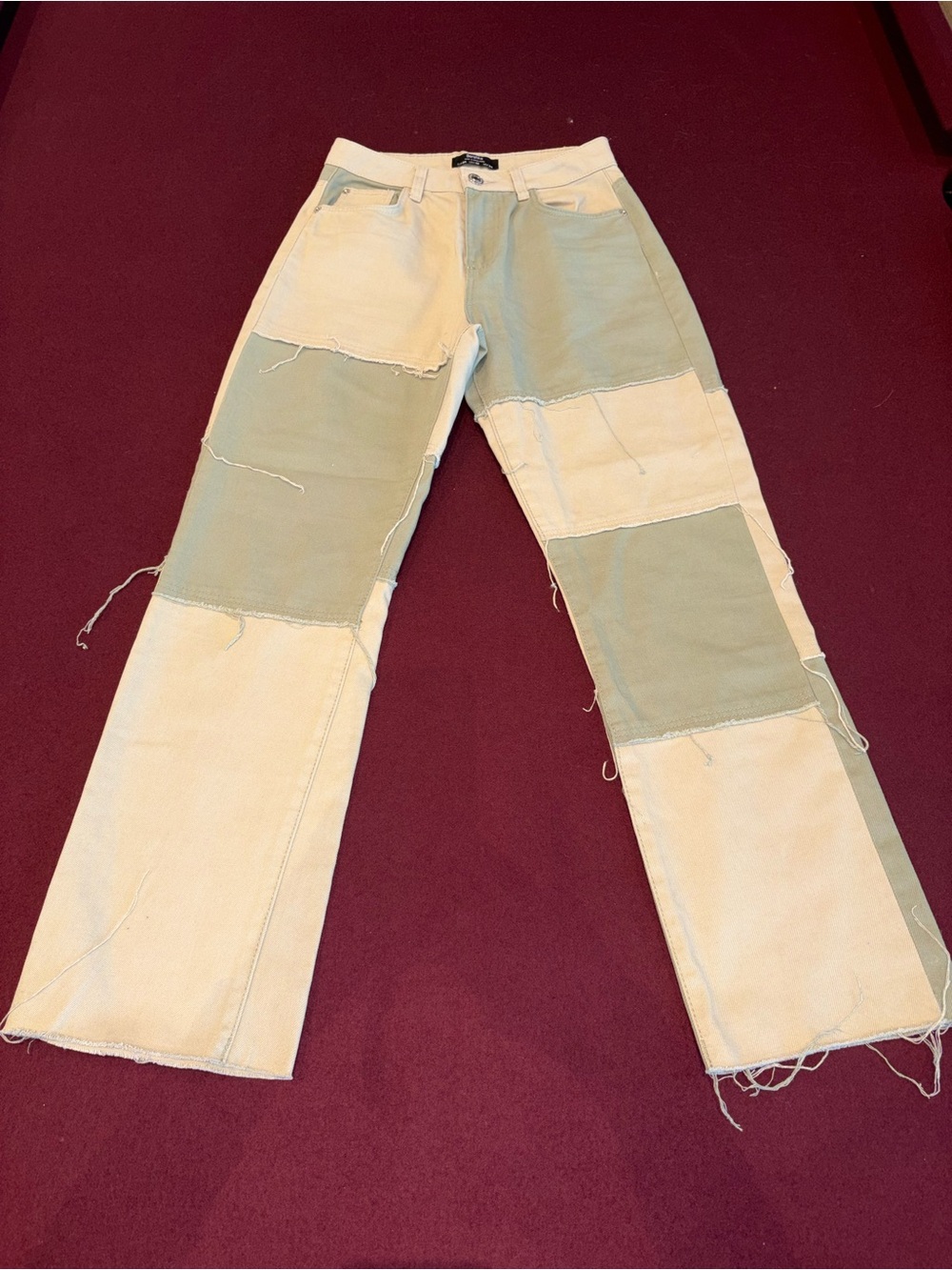 Bershka Two-Tone Patchwork Flare Jeans in Cream and Sage Green